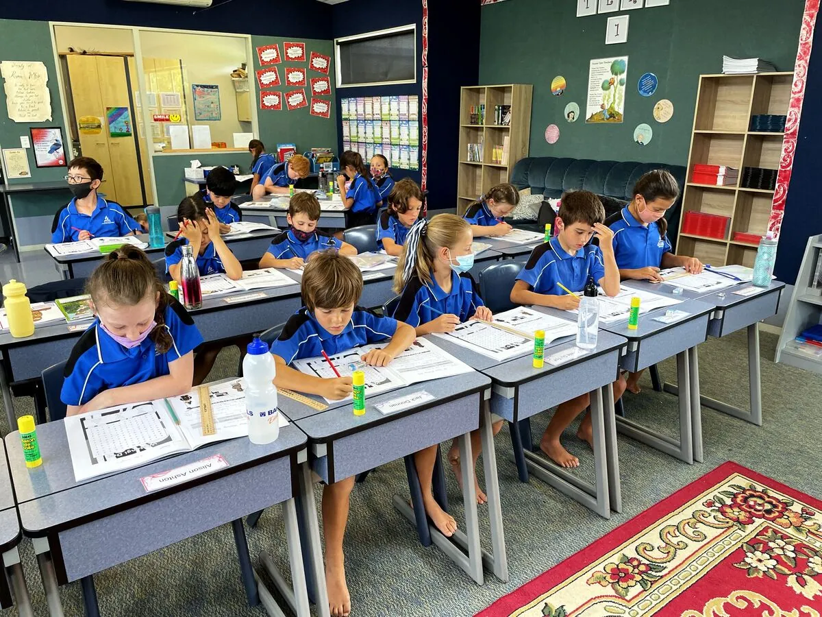 Primary students working at their desks